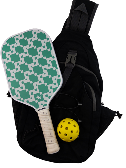 Green and white paddle with geometric knitpattern, yellow ball, and black bag on a white background