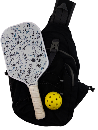 Black backpack with a Splatter pickleball paddle and yellow ball on a white background