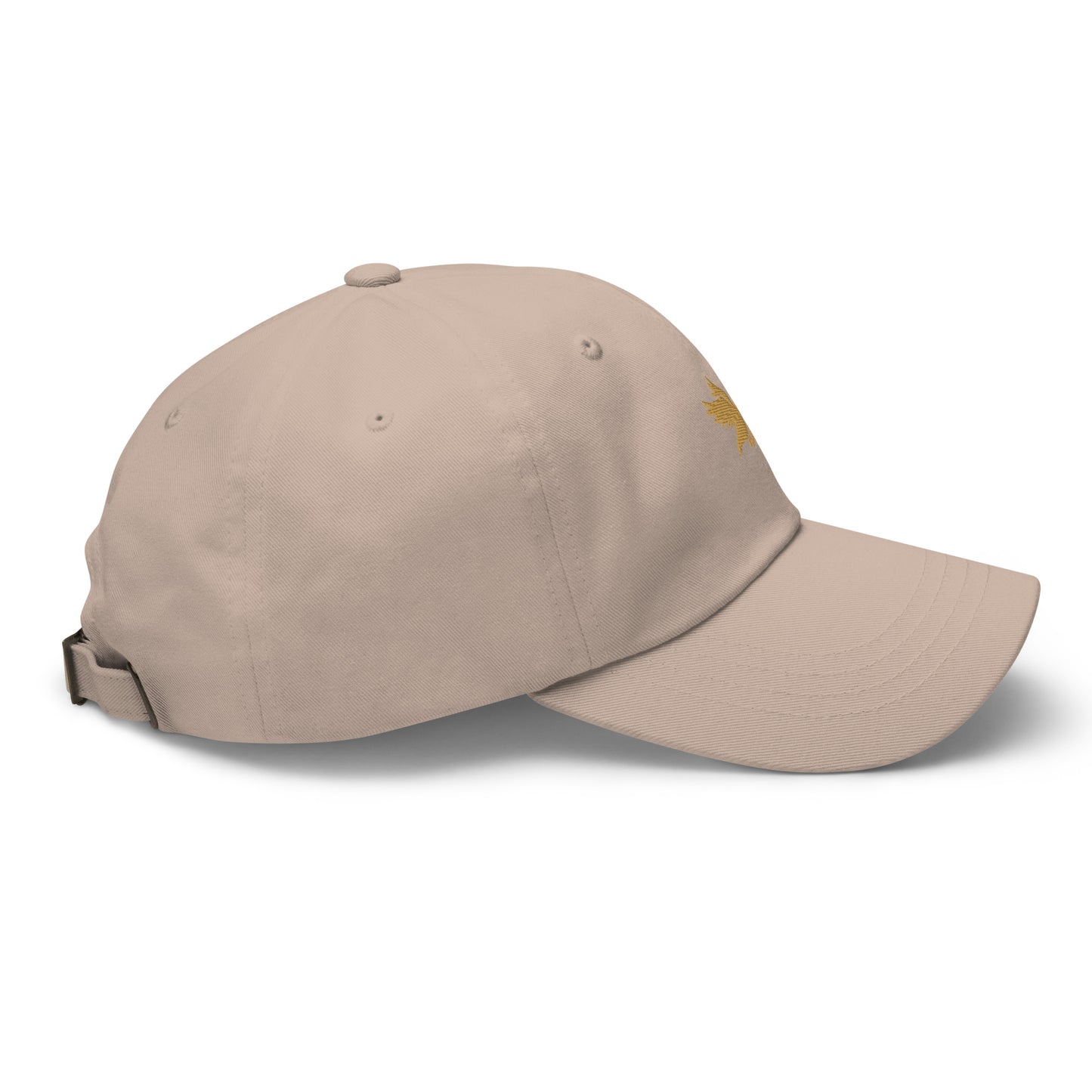Side view of a tan and gold dad hat with Tisdell logo of bird holding a pickleball paddle.