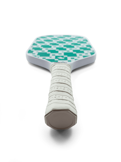 Checkered green knit paddle with a white handle on a transparent background