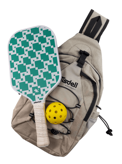 Pickleball paddle with green and white pattern, yellow ball, and beige bag on a transparent background