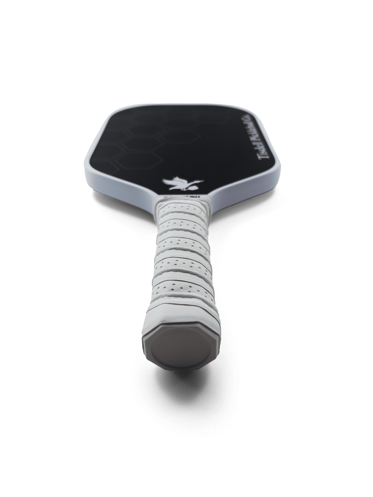 Black pickleball paddle with white handle on a transparent background