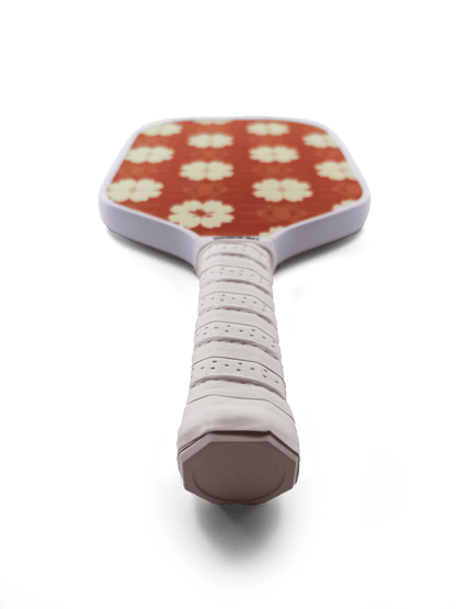 Paddle with red floral pattern on a transparent background