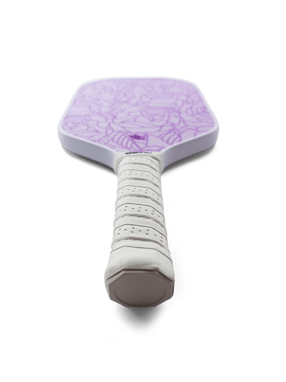 Purple Roses pickleball paddle with white handle on a transparent background