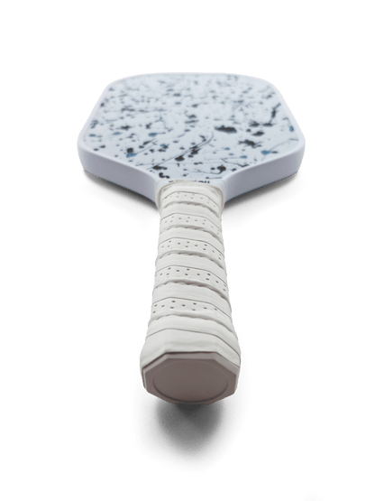 Paddle with speckled design on a transparent background