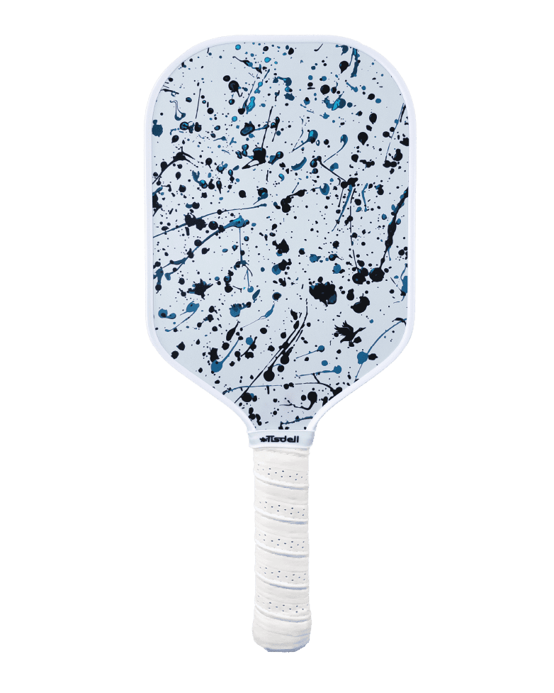 Pickleball paddle with a white handle and blue and black splatter design on a transparent background
