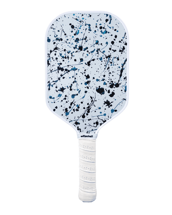 Pickleball paddle with a white handle and blue and black splatter design on a transparent background